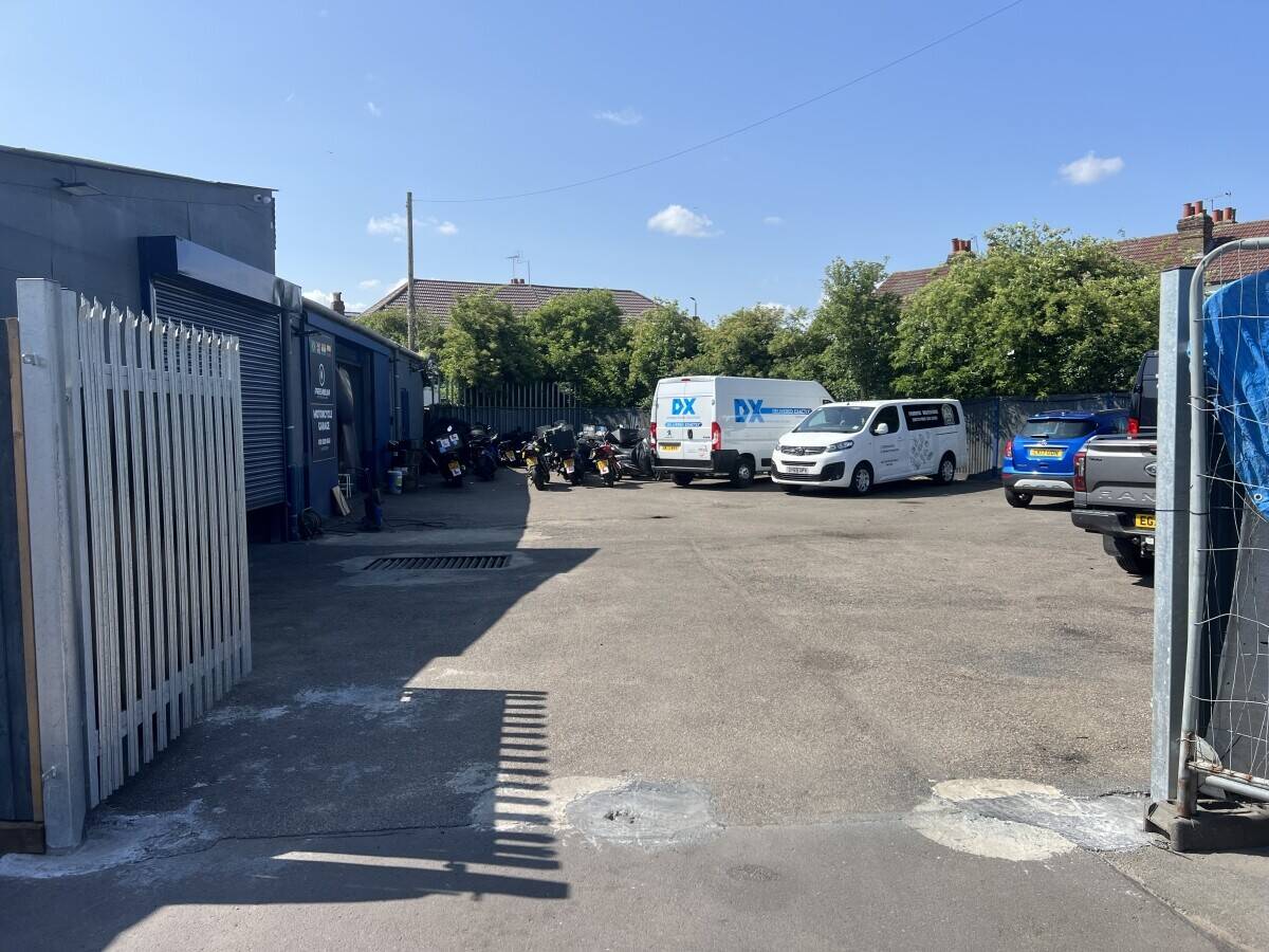 Car garage workshop for sale in Orpington with two large units and ample parking available. Photo 3