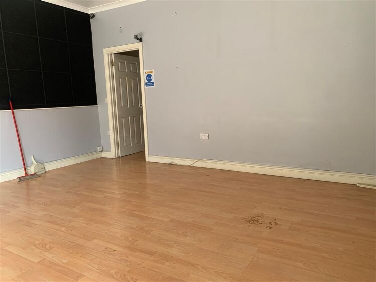 A ground floor retail unit of approximately 925 sq ft, located on hollway road, stockwood. the premises comprises an open plan front and rear shop are Photo 3
