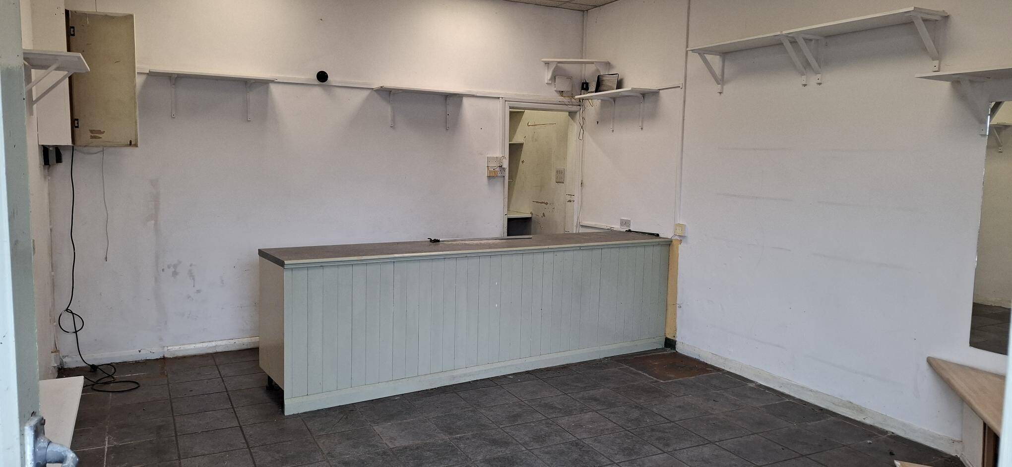 Freehold retail unit for sale in Grimsby Lincolnshire with good parking and a prominent location Photo 3