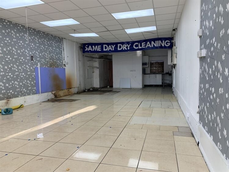 Ground floor retail unit of approximately 834 sq ft arranged as open plan retail area with rear kitchenette, and wc facilities. Photo 3
