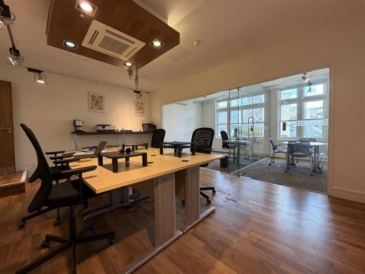 A well presented office suite extending to approximately 511 sq ft, thoughtfully arranged to provide a spacious open plan working area with the benefi Photo 3