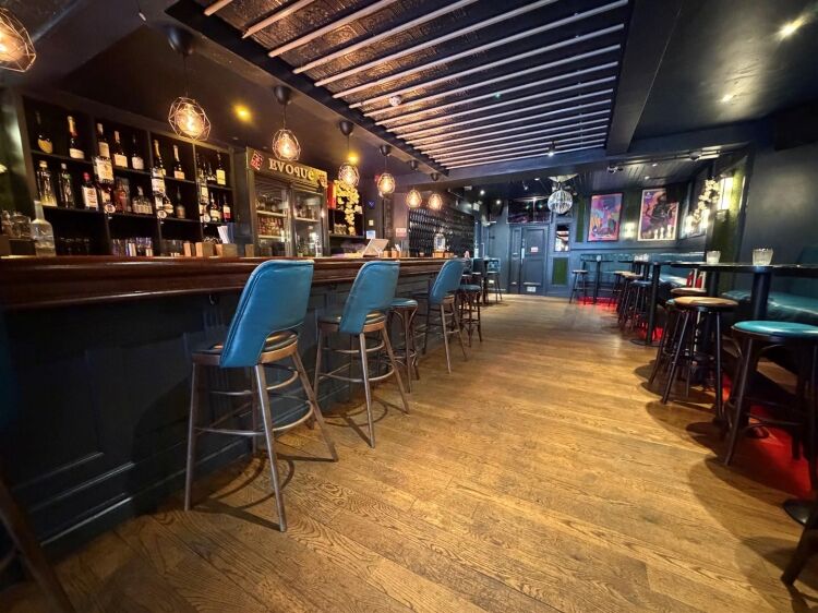 A fully fitted bar of approximately 1,035 ft² with additional basement stores and toilets, and an enclosed rear courtyard garden. the unit was pr Photo 3