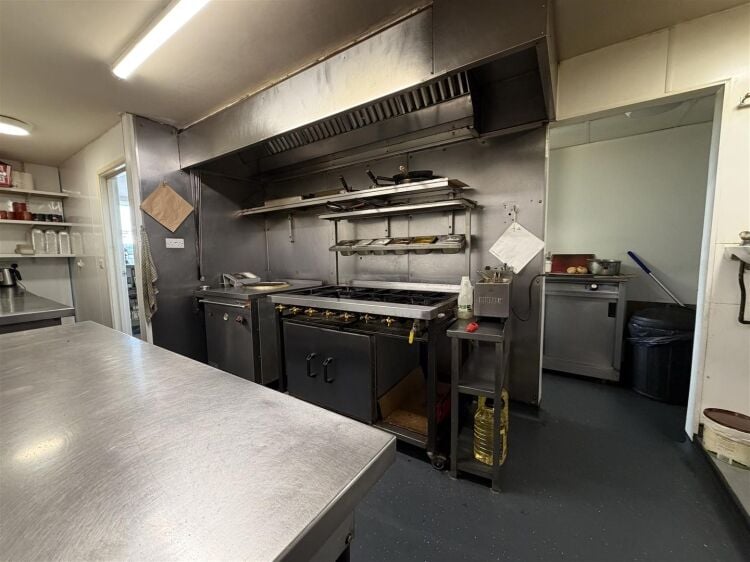 A fully fitted takeaway premises extending to approximately 876 sq ft. Photo 3