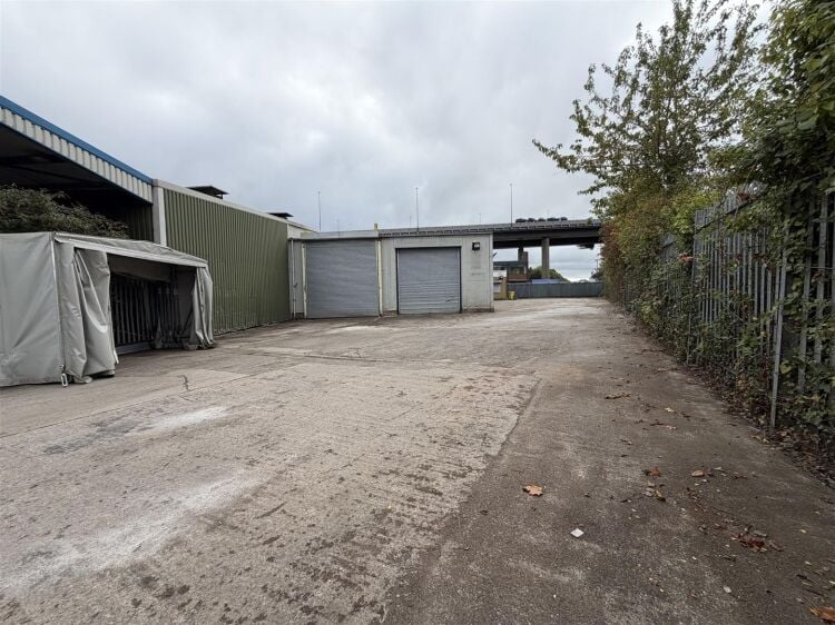 An end of terrace industrial unit measuring approximately 5,886 sq ft (546.8 sq m). the unit benefits from a spacious yard to the side and front provi Photo 3