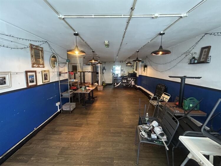 Ground floor restaurant/café of approximately 900 sq ft, with an additional basement level providing useful ancillary storage space. the property is Photo 3