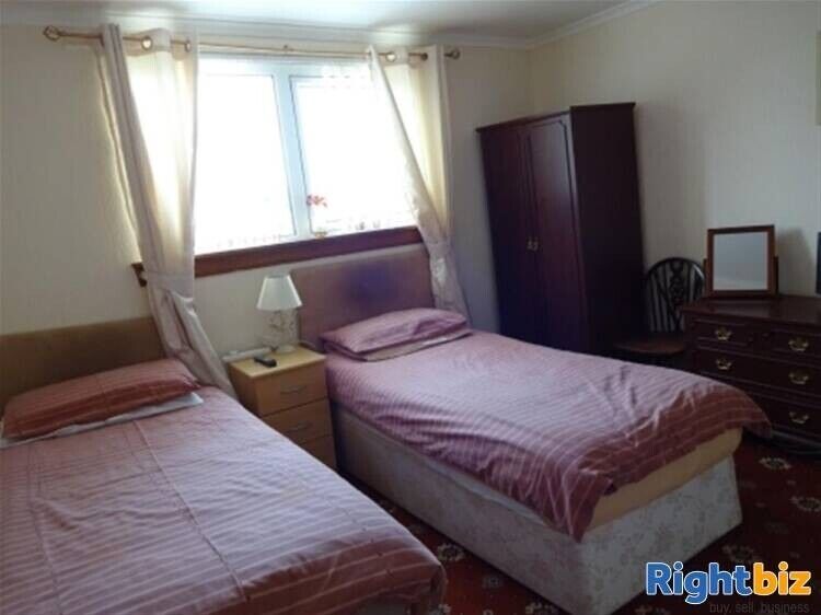 Exquisite 7-Bed Semi-Detached Coastal B&B in Ayrshire with High Occupancy Photo 3