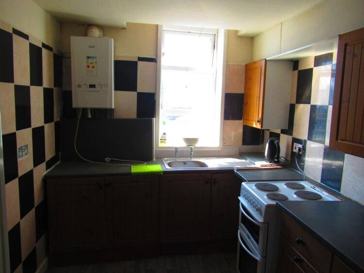 Freehold Business Property with Vacant Flat in Blackburn, Ideal Investment Photo 4