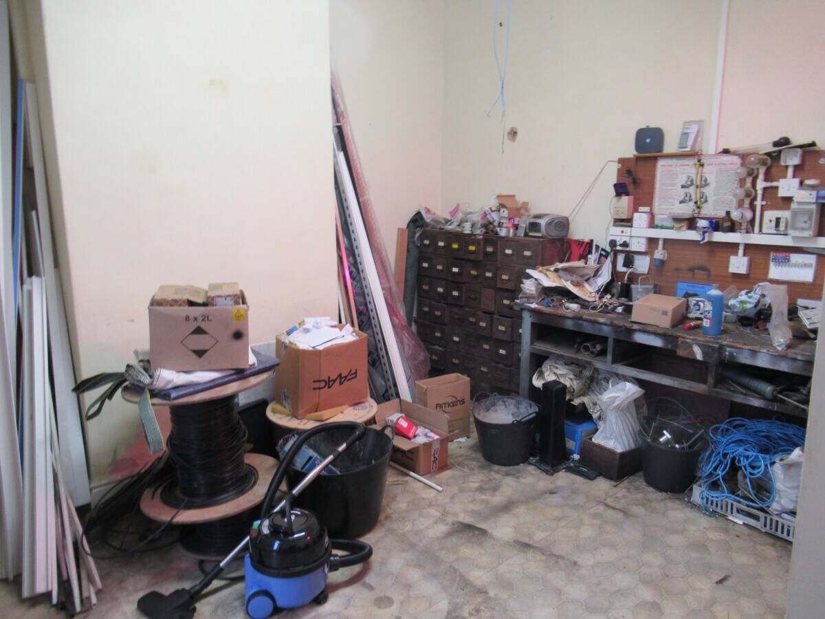 Secure Freehold Commercial Space with Yard and Off-Street Parking in Blackburn Photo 4