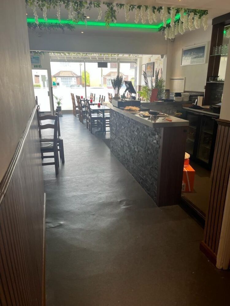 A partially fitted restaurant of approx 710 ft² benefiting from commercial extraction, bar, friends, and a partially fitted kitchen. we understan Photo 4
