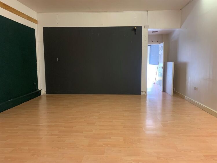 A ground floor retail unit of approximately 925 sq ft, located on hollway road, stockwood. the premises comprises an open plan front and rear shop are Photo 4