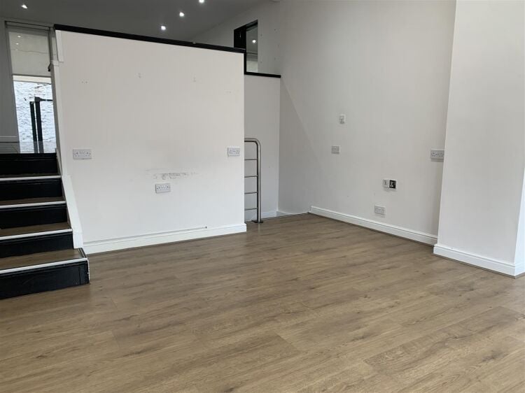 A very well presented retail unit of approximately 770 ft² arranged over two floors benefiting from a further terrace to the rear. the shop is ar Photo 4