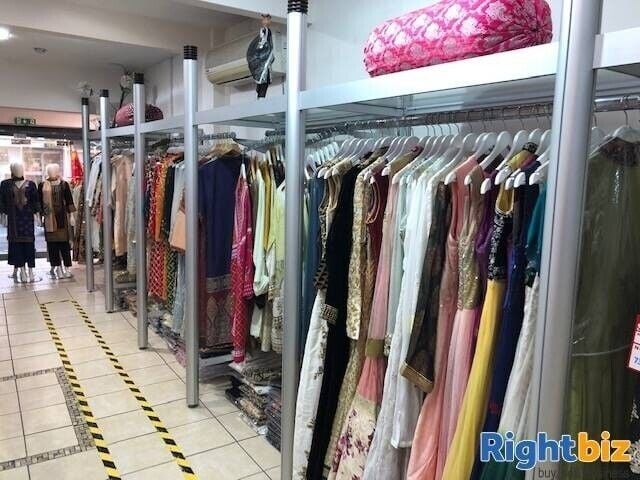 Prime A1/A2 Shop Unit in Vibrant Luton Suburb, Trading as Asian Fashion Store Photo 4