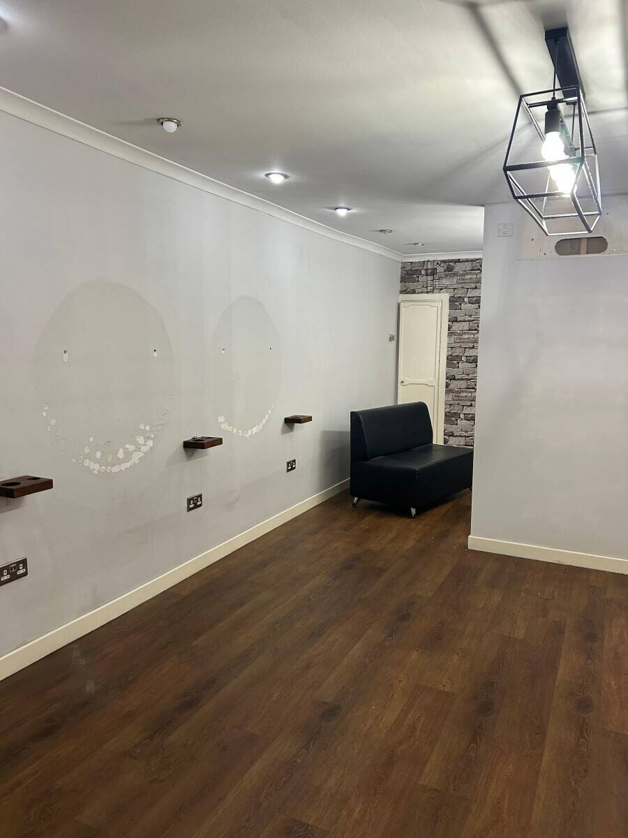 Freehold Retail Property in Airdrie with Potential for Residential Conversion Photo 4