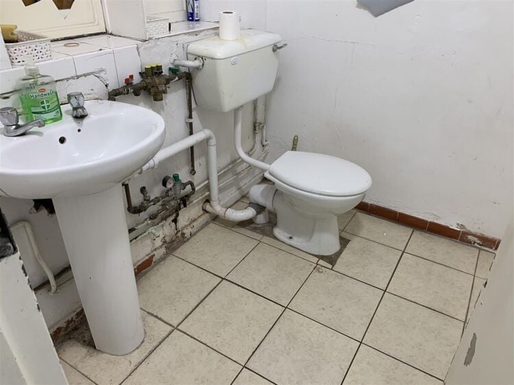 Ground floor retail unit of approximately 834 sq ft arranged as open plan retail area with rear kitchenette, and wc facilities. Photo 4