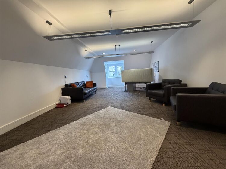 A well presented office suite extending to approximately 436 sq ft, thoughtfully arranged to provide a spacious open plan working area with shared kit Photo 4