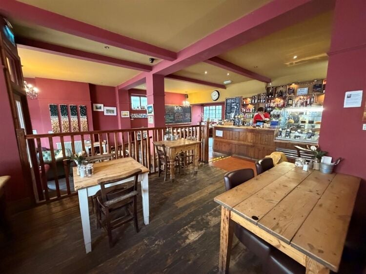 A fully fitted restaurant/bar extending to approximately 1,580 ft² benefiting from a fully equipped commercial kitchen, enclosed rear garden, and Photo 4