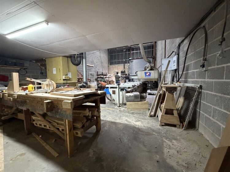 An industrial unit, currenting arranged as a joiners, of approximately 1,536 sq ft located within the printworks development which is currently underg Photo 4