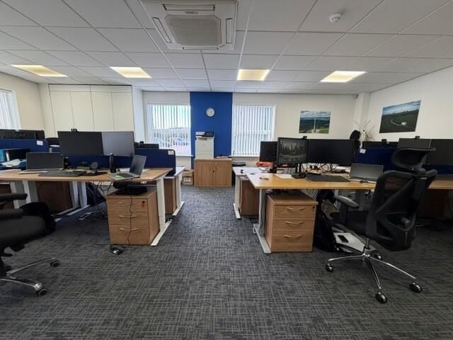 A modern semi detached office of approximately 2,272 ft² (211m²) arranged over two floors, with additional toilets, shower and reception lo Photo 4