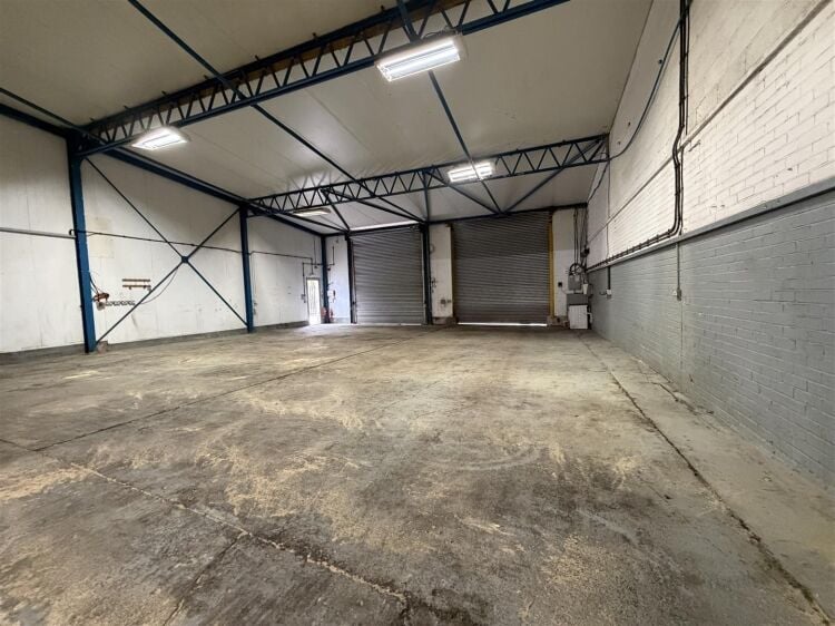 An end of terrace industrial unit measuring approximately 5,886 sq ft (546.8 sq m). the unit benefits from a spacious yard to the side and front provi Photo 4