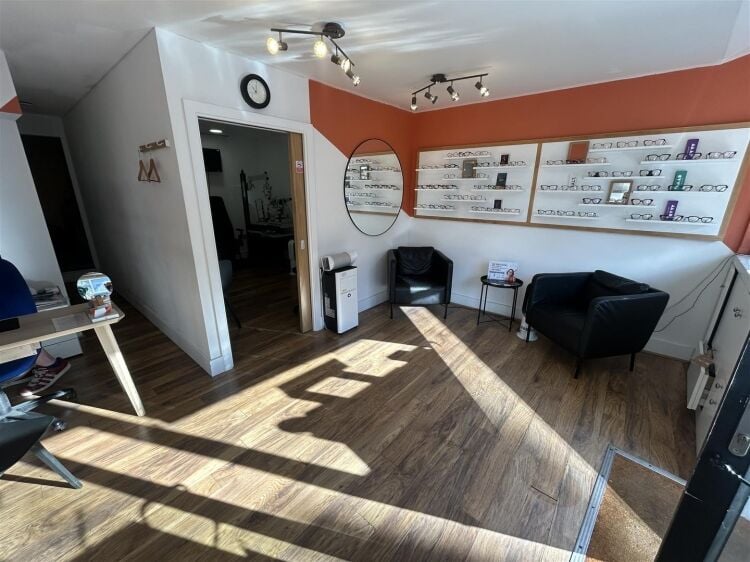 Ground floor retail unit in Bedminster, Bristol leased to an optician on a 10-year term Photo 4
