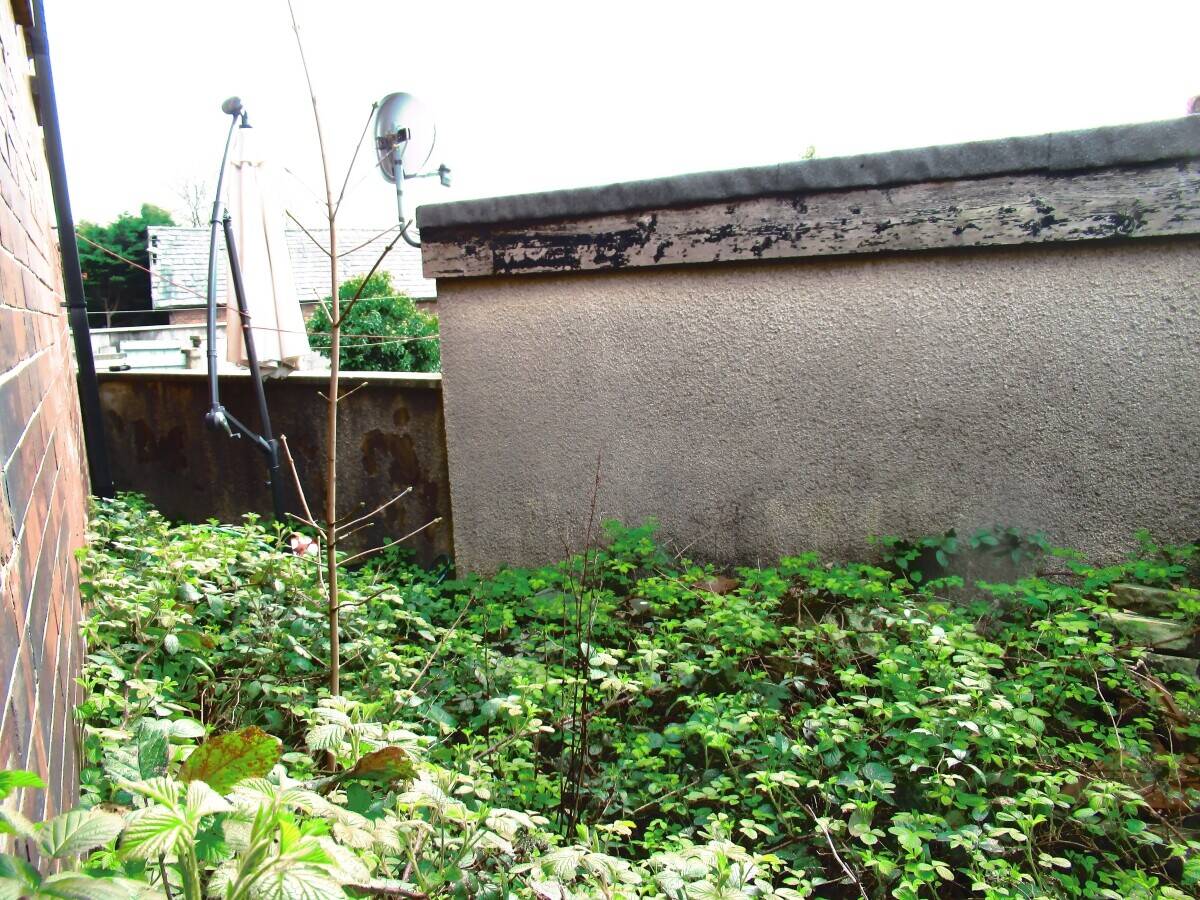Renovation Ready Detached Property in Blackburn's Heart Photo 5