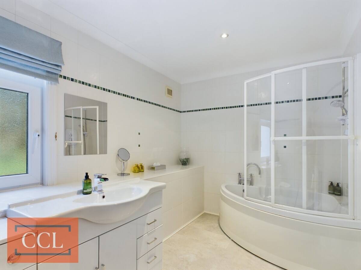 Victorian Charm Meets Modern Comfort in Expansive Lochwood House For Sale Photo 5