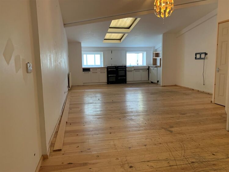 An end of terrace two storey workshop/office of approximately 1,014 ft² (94m²) with roller shutter access and off street parking to the fron Photo 5