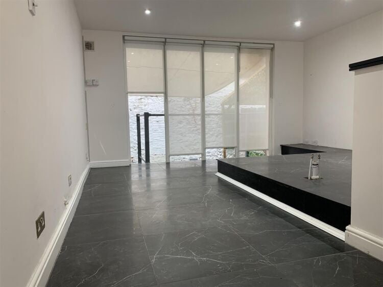 A very well presented retail unit of approximately 770 ft² arranged over two floors benefiting from a further terrace to the rear. the shop is ar Photo 5
