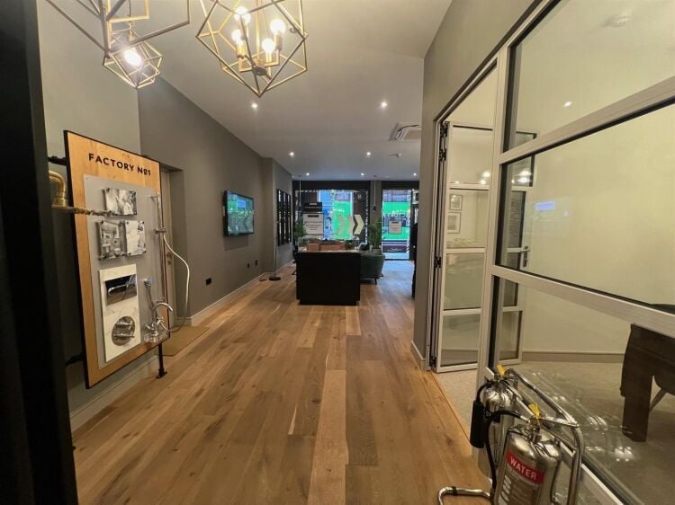 A modern retail unit of approximately 1,049 ft² situated in a busy trading position in imperial arcade, part of the city & country factory no. 1 Photo 5