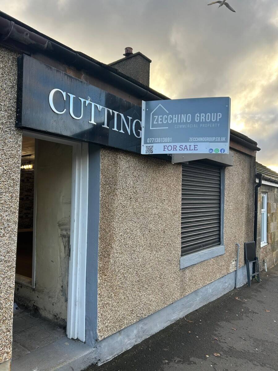 Freehold Retail Property in Airdrie with Potential for Residential Conversion Photo 5