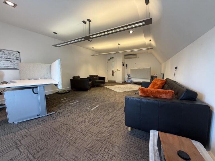 A well presented office suite extending to approximately 436 sq ft, thoughtfully arranged to provide a spacious open plan working area with shared kit Photo 5