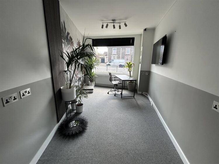 A modern ground-floor retail unit extending to approximately 957 sq ft, prominently positioned on a corner plot. the property is well-presented throug Photo 5
