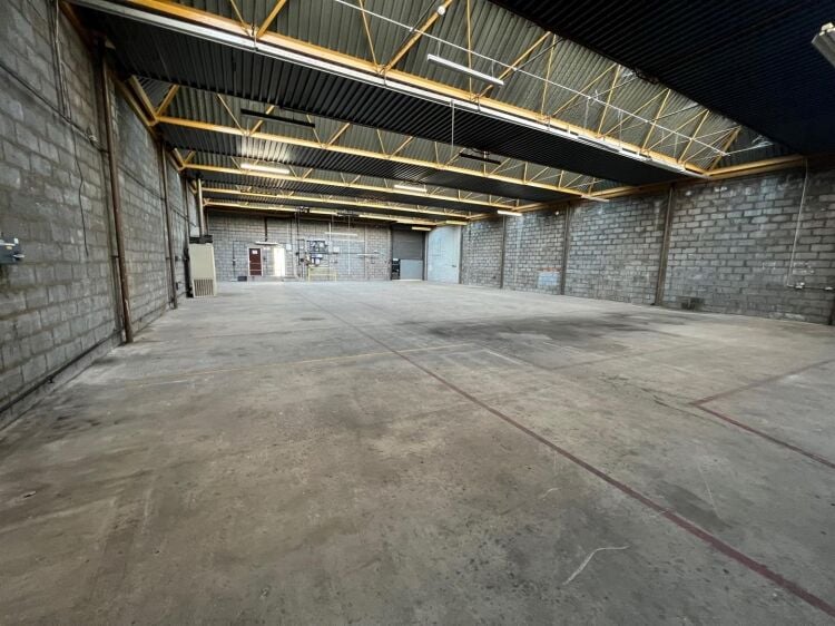 A well presented industrial unit of approximately 5,860 ft² arranged predominantly as a warehouse with ancillary offices/reception, male and fema Photo 5