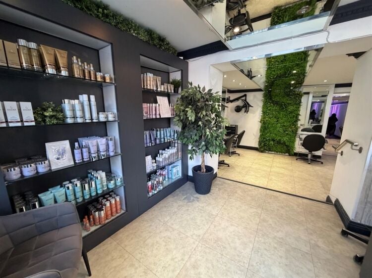 An extended two-storey retail premises located in the town centre, let to reflections hair salon at £32,000 per annum on a 10-year fully repairin Photo 5