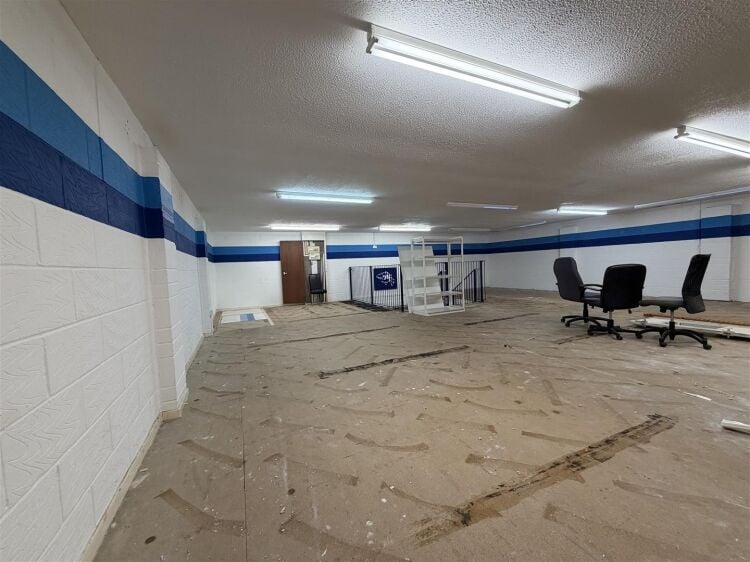 The property comprises a substantial retail unit extending to approximately 4,912 sq ft, arranged over ground and first floors. Photo 5