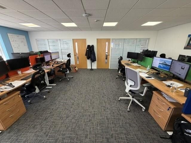 A modern semi detached office of approximately 2,272 ft² (211m²) arranged over two floors, with additional toilets, shower and reception lo Photo 5