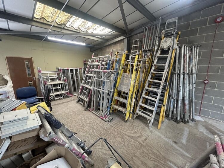 A modern industrial unit of approx 2,994 ft². the ground floor is arranged as a unit with roller shutter access with reception/office, kitchen a Photo 5