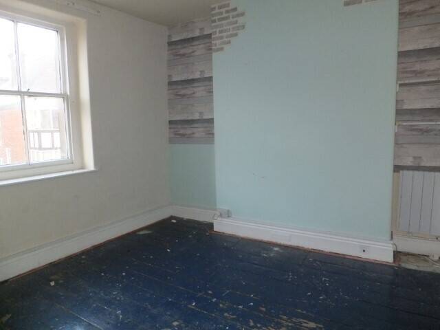 Buxton Mixed Use Property with Development Potential in Prime Shopping Area Photo 6