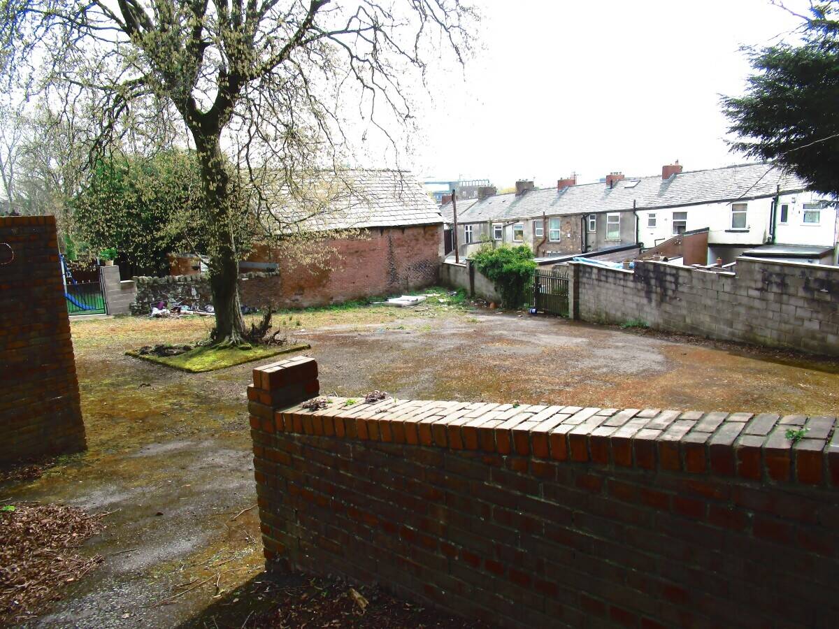 Renovation Ready Detached Property in Blackburn's Heart Photo 6