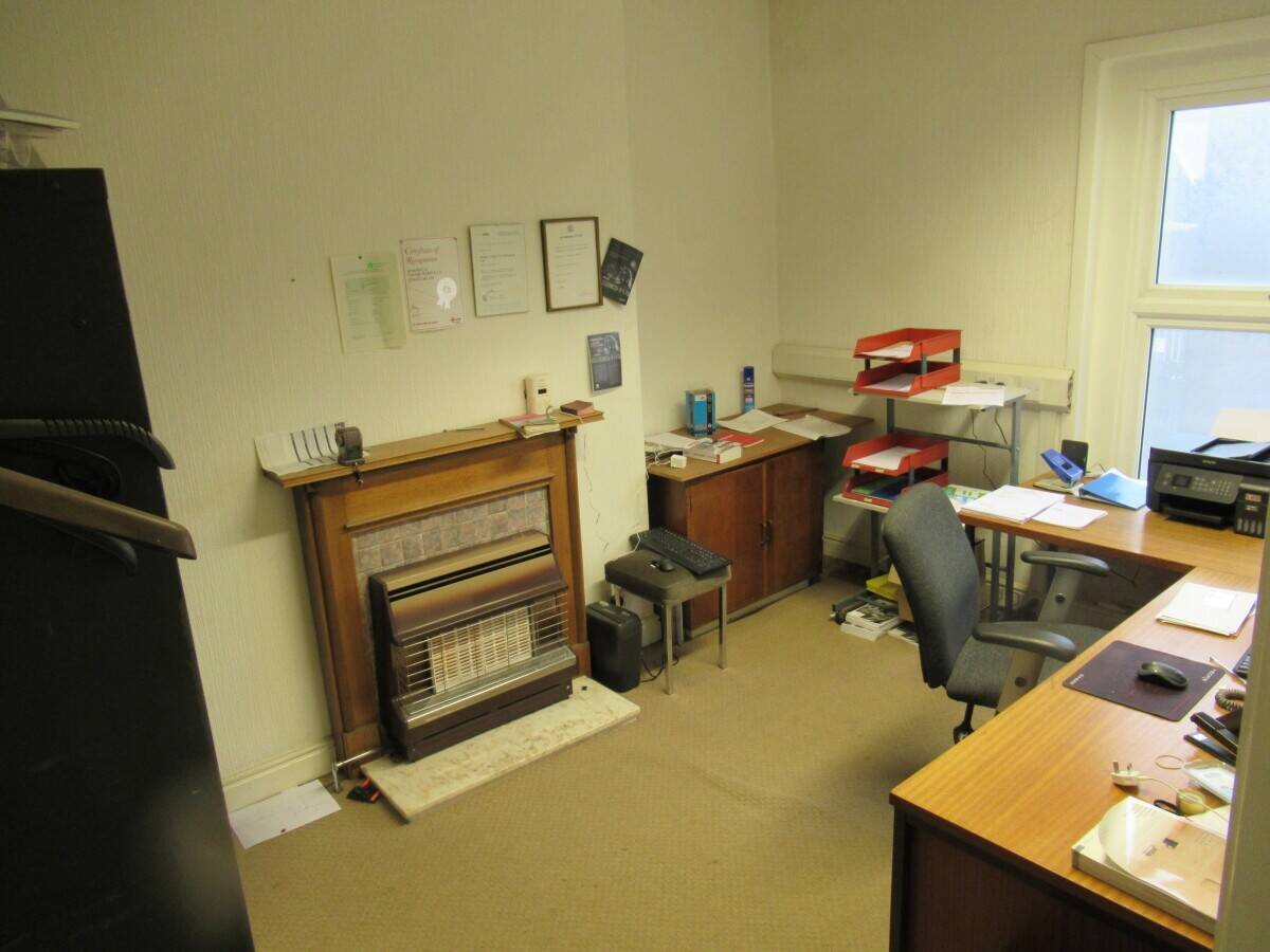 Secure Freehold Commercial Space with Yard and Off-Street Parking in Blackburn Photo 6