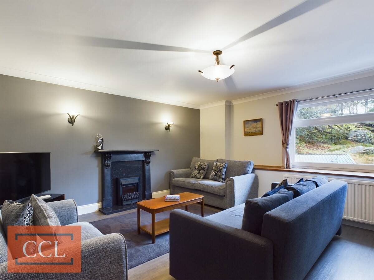 Victorian Charm Meets Modern Comfort in Expansive Lochwood House For Sale Photo 6