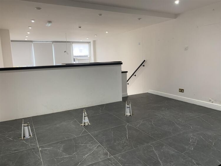 A very well presented retail unit of approximately 770 ft² arranged over two floors benefiting from a further terrace to the rear. the shop is ar Photo 6