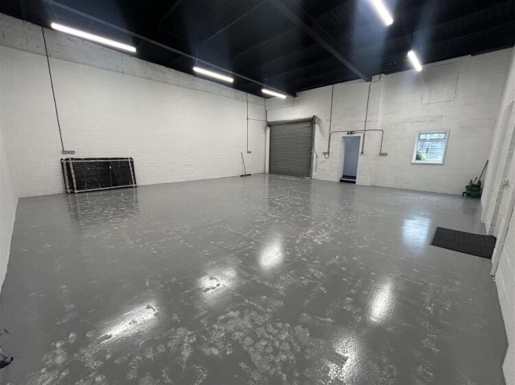 Light industrial unit extending to approximately 1,612 sq ft, configured to provide predominantly open plan workshop accommodation complemented by a s Photo 6