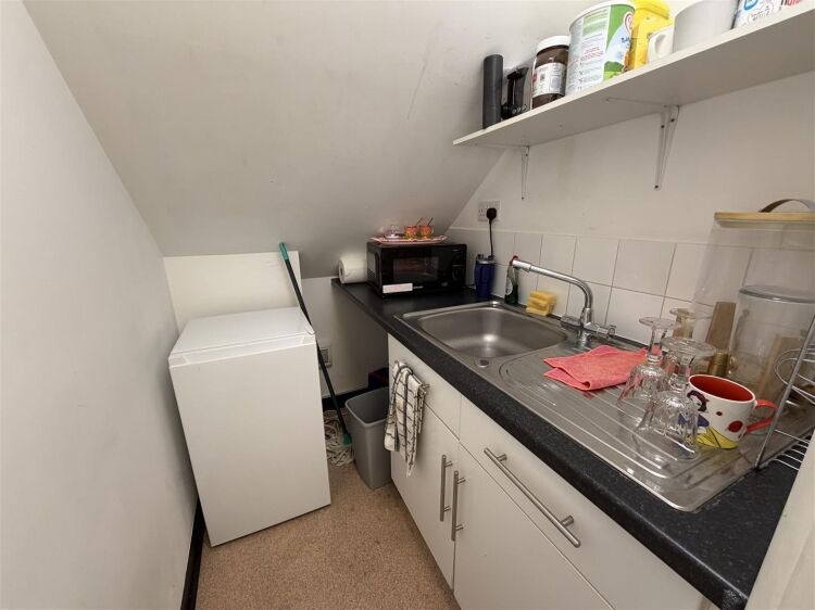 A well presented office suite extending to approximately 436 sq ft, thoughtfully arranged to provide a spacious open plan working area with shared kit Photo 6