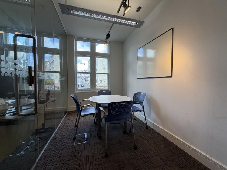 A well presented office suite extending to approximately 511 sq ft, thoughtfully arranged to provide a spacious open plan working area with the benefi Photo 6