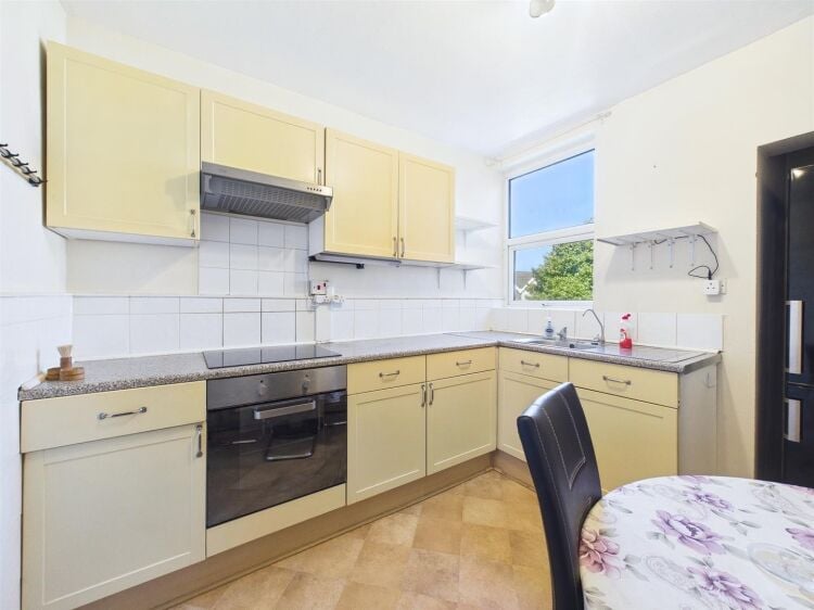 A large mixed-use investment property arranged as a ground floor shop (of approx. 740 ft²) with a large and self contained 2 bedroom flat above a Photo 6