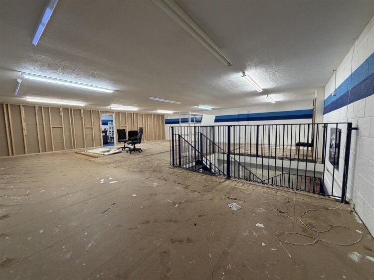 The property comprises a substantial retail unit extending to approximately 4,912 sq ft, arranged over ground and first floors. Photo 6