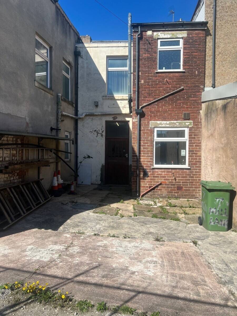 Secure Freehold Commercial Space with Yard and Off-Street Parking in Blackburn Photo 7