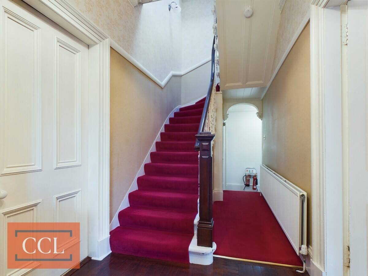 Victorian Charm Meets Modern Comfort in Expansive Lochwood House For Sale Photo 7
