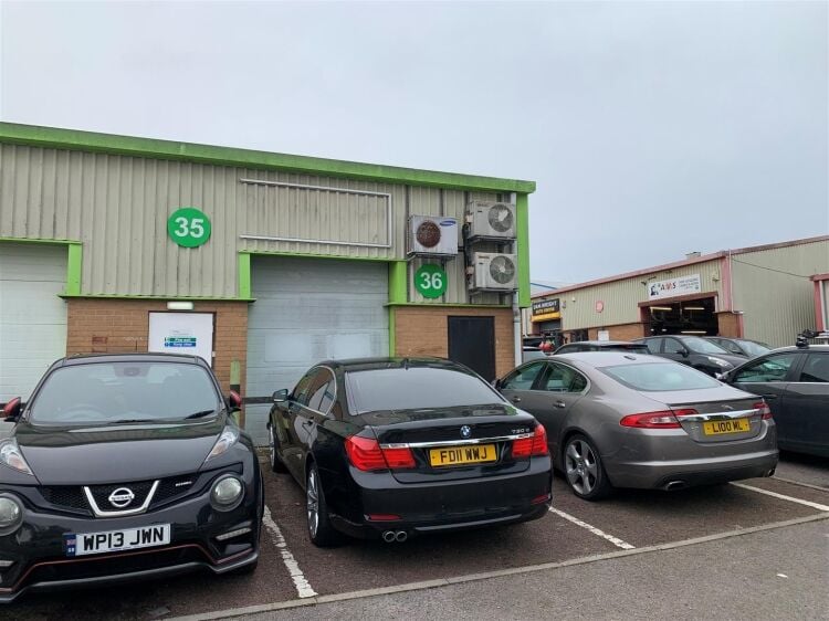 An end of terrace two storey workshop/office of approximately 1,014 ft² (94m²) with roller shutter access and off street parking to the fron Photo 7